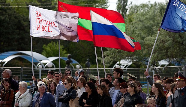 Pro-Russian rebels in Tiraspol have asked Russia for protection. The rebels are seen here waving the Transnistrian and Russian flags, in 2014.
Mandatory Credit:	Vadim Denisov/AFP/Getty Images via CNN Newsource