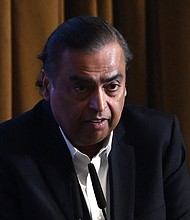 Chairman and managing director of Reliance Industries Mukesh Ambani delivers a speech during the inauguration of the Bengal Global Business Summit (BGBS) in Kolkata in November 2023.
Mandatory Credit:	Dibyangshu Sarkar/AFP/Getty Images via CNN Newsource