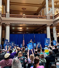 Kit Malone, an advocacy strategist with the American Civil Liberties Union of Indiana, leads a rally at the statehouse in Indianapolis on Tuesday, May 24, 2022.
Mandatory Credit:	Casey Smith/Report for America/AP via CNN Newsource