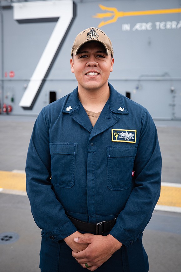 Petty Officer 2nd Class Jairo Rodriguez a native of Missouri City, Texas, serves the U.S. Navy aboard USS Tripoli operating …
