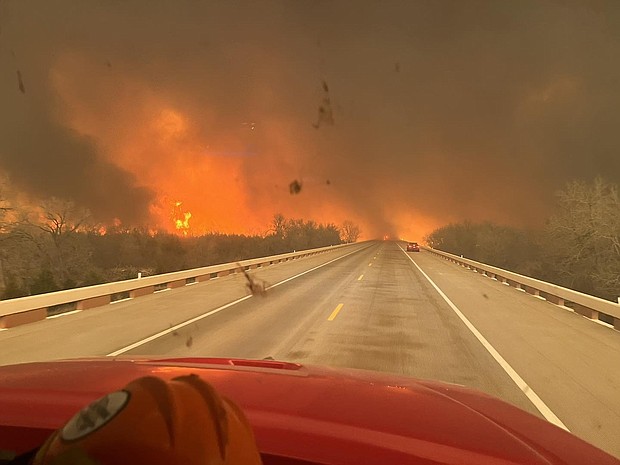 At least 1 dead as large wildfires sweep through the Texas panhandle.
Mandatory Credit:	Greenville Fire-Rescue via CNN Newsource