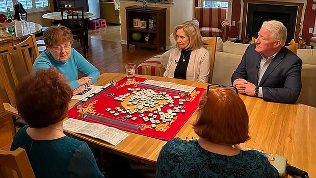 John King observes Easton, Pennsylvania, resident Darrell Ann Murphy and friends playing Mahjong at her home.
Mandatory Credit:	CNN via CNN Newsource