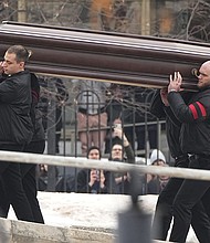 Mourners chanted "Navalny! Navalny!" as the Kremlin critic's coffin is carried to the Moscow church hosting his funeral.
Mandatory Credit:	AP via CNN Newsource