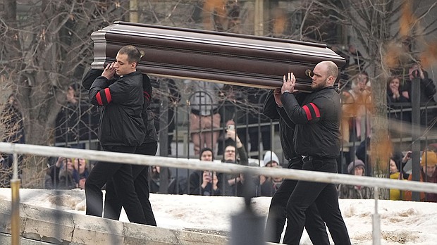 Mourners chanted "Navalny! Navalny!" as the Kremlin critic's coffin is carried to the Moscow church hosting his funeral.
Mandatory Credit:	AP via CNN Newsource