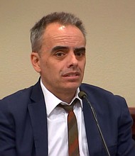 Joel Souza, the director and screenwriter of "Rust" film, speaks on the witness stand on March 1. Souza testified on Friday about the moment he was shot on set.
Mandatory Credit:	Pool via CNN Newsource