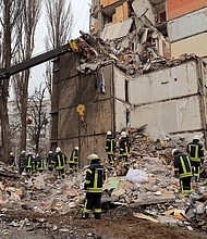 At least four have been declared killed after the drone strike hit a residential building in Odesa.
Mandatory Credit:	Oleksandr Gimanov/AFP/Getty Images via CNN Newsource