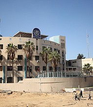 Destruction surrounding the UNRWA headquarters in Gaza City last month.
Mandatory Credit:	Dawoud Abo Alkas/Anadolu/Getty Images via CNN Newsource