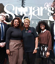 (L-R) Mark Geil, interim chair for JSU’s Department of Art, with Reshonda Perryman, director of branding and creative engagement for Visit Jackson, Glenda Barner, owner of Sugar’s Place, and graphic design students Ashanti Stiff and Tyler Tremble in front of Sugar’s Place downtown Jackson. (William H. Kelly III/Jackson State University)