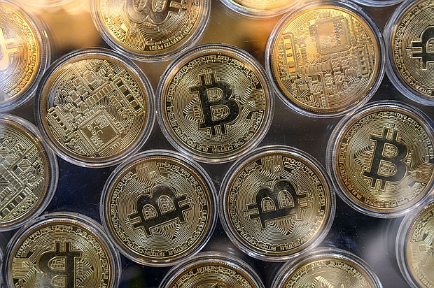 Bitcoin surged to its all-time high on March 4, shaking off a more than two-year rut that put the future of the entire crypto ecosystem in question.
Mandatory Credit:	Ozan Kose/AFP/Getty Images via CNN Newsource