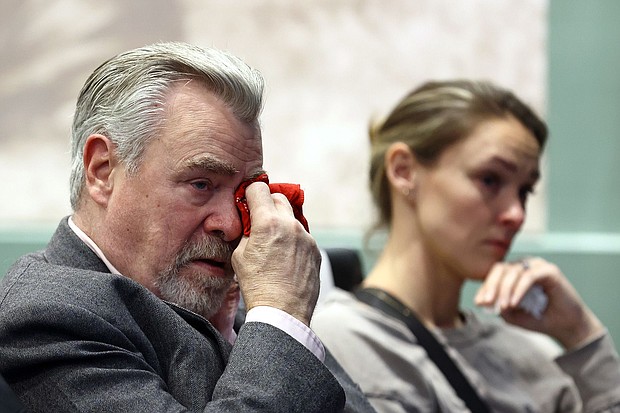 Ed (left) and Kylie, Jason's wife (right), react during Jason's NFL retirement announcement on March 4, in Philadelphia.
Mandatory Credit:	Tim Nwachukwu/Getty Images via CNN Newsource