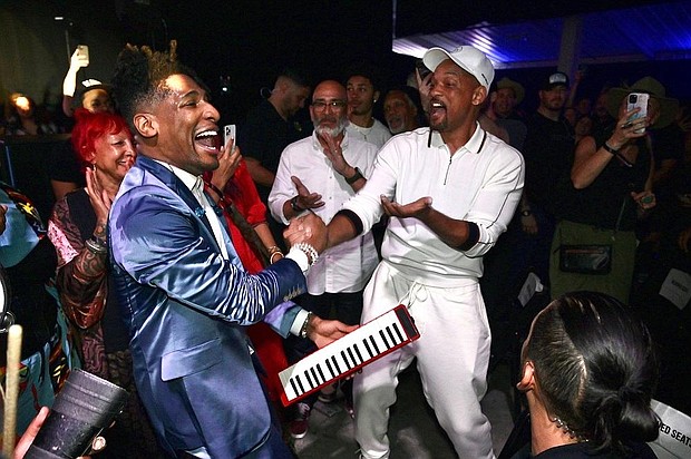 (Photo Jon Batiste & Will Smith during Montreux Jazz Festival Miami, credit @mannyofmiami)