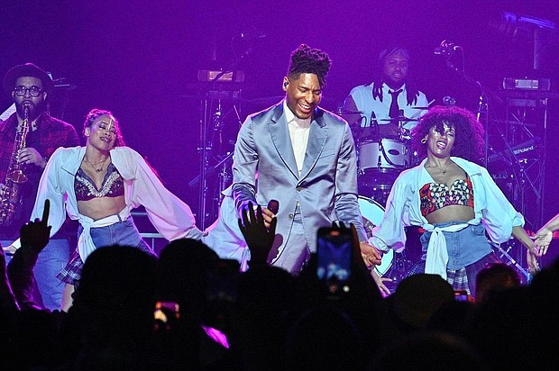 (Photo Jon Batiste performing during Montreux Jazz Festival Miami. Credit @MannyofMiami)