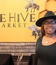 Brandi Battle recently opened her restaurant, The Hive, above, at the corner of Marshall
and Adams streets in Jackson Ward.