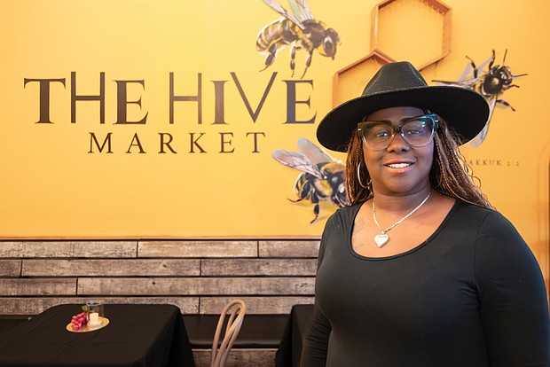 Brandi Battle recently opened her restaurant, The Hive, above, at the corner of Marshall
and Adams streets in Jackson Ward.