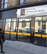 New York Community Bank customers withdrew $6 billion in one month.
Mandatory Credit:	Ted Shaffrey/AP via CNN Newsource