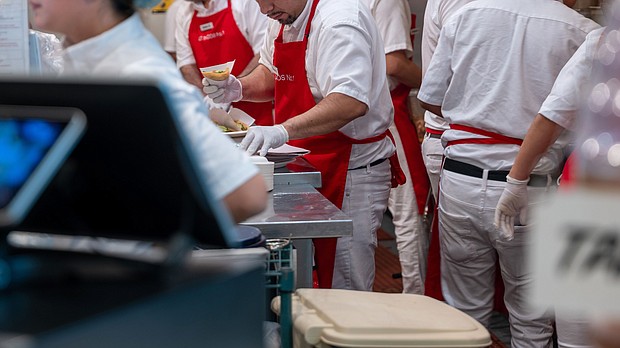 People work at a restaurant at Chelsea Market in Manhattan on February 02, in New York City.
Mandatory Credit:	Spencer Platt/Getty Images via CNN Newsource