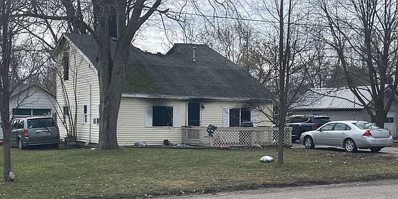 A woman was killed and two others were injured after a house exploded and caught fire in Gratiot County.