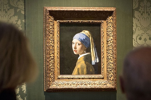 Three Belgian climate activists who were previously sentenced to prison for a protest targeting Johannes Vermeer’s painting “Girl with a …