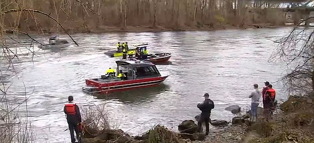 Clackamas firefighters and the Oregon City Police Department worked together to pull the body of a driver out of a car that drove into the Clackamas River.
Mandatory Credit:	KPTV via CNN Newsource