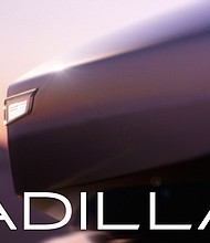 Cadillac’s concept vehicle, Opulent Velocity, with illuminated Cadillac emblem.