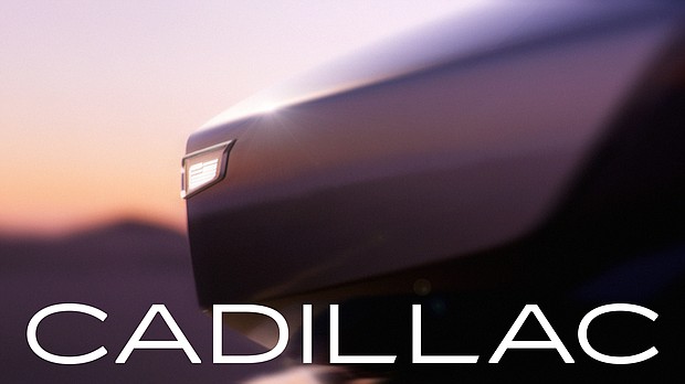 Cadillac’s concept vehicle, Opulent Velocity, with illuminated Cadillac emblem.