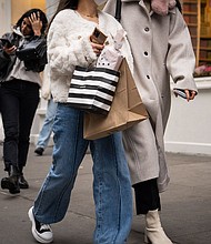A shopper carries a Sephora bag in the SoHo neighborhood of New York, on January 21, 2023.
Mandatory Credit:	Jordana Bermudez/Bloomberg/Getty Images via CNN Newsource