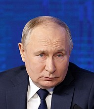 Russian President Vladimir Putin attends a meeting with his confidants for the 2024 election at Gostiny Dvor in Moscow, Russia January 31.
Mandatory Credit:	Maxim Shemetov/Reuters via CNN Newsource