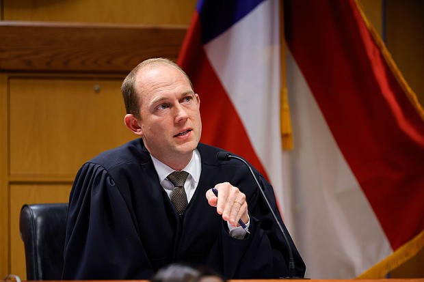 Fulton County Superior Judge Scott McAfee dismisses some counts against Trump, co-defendants but leaves most of Georgia election case intact
Mandatory Credit:	Alex Slitz/Pool/AP via CNN Newsource