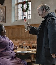 This image released by Focus Features shows Da’Vine Joy Randolph, from left, Paul Giamatti and Dominic Sessa in a scene from “The Holdovers.”