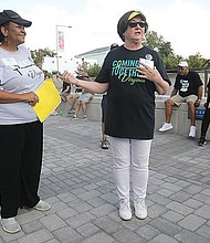 Danita Rountree Green, left, and Martha Rollins are co-CEOs of Coming Together Virginia, a local nonprofit organization that typically unites people over a meal to have difficult conversations. On Aug. 27, 2022 the women led Richmond-area residents on a Unity Walk to commemorate the 59th anniversary of Dr. Martin Luther King Jr.’s, “I Have a Dream” speech.