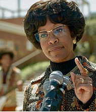 Regina King as Shirley Chisolm