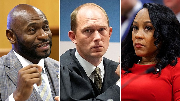 Fulton County Special Prosecutor Nathan Wade, Fulton County Superior Judge Scott McAfee and Fulton County District Attorney Fani Willis.
Mandatory Credit:	Pool/Getty Images via CNN Newsource
