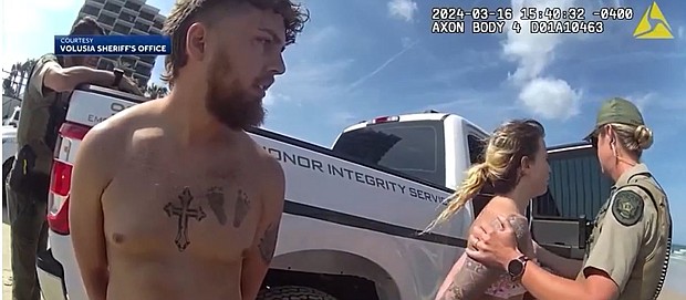 A Georgia couple was arrested in Volusia County on Daytona Beach after deputies say the two were intoxicated and asleep on the beach while their children were nowhere to be found.
Mandatory Credit:	WESH via CNN Newsource