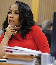 Fulton County District Attorney Fani Willis looks on during a hearing on the Georgia election interference case, Friday, March, 1, in Atlanta.