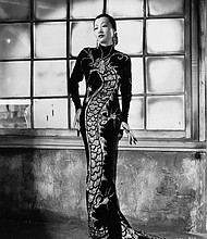 Anna May Wong wears a dress with a dragon motif in 1934.
Mandatory Credit:	John Kobal Foundation/Moviepix/Getty Images via CNN Newsource
