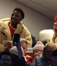 Jerrod Carmichael and Taylor Swift at an NFL game in January.
Mandatory Credit:	Al Bello/Getty Images via CNN Newsource