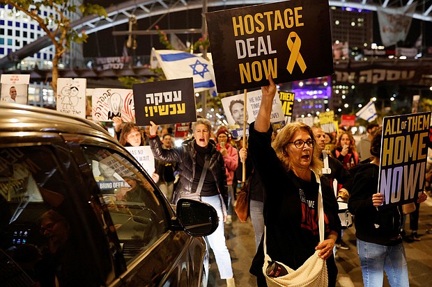 Demonstrators call for the release of Israeli hostages being held by Hamas during a protest in Tel Aviv on March 17, 2024.
Mandatory Credit:	Carlos Garcia Rawlins/Reuters via CNN Newsource