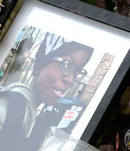 An image of Jayden Perkins is seen at a memorial on March 15.
Mandatory Credit:	WBBM via CNN Newsource