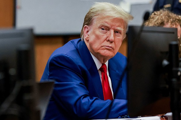 Former President Donald Trump attends a hearing to determine the date of his trial for allegedly covering up hush money payments linked to extramarital affairs, at Manhattan Criminal Court in New York City on March 25.
Mandatory Credit:	Justin Lane/Pool/AFP via Getty Images via CNN Newsource