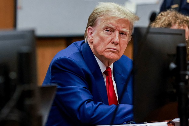 Former President Donald Trump attends a hearing to determine the date of his trial for allegedly covering up hush money payments linked to extramarital affairs, at Manhattan Criminal Court in New York City on March 25.
Mandatory Credit:	Justin Lane/Pool/AFP via Getty Images via CNN Newsource
