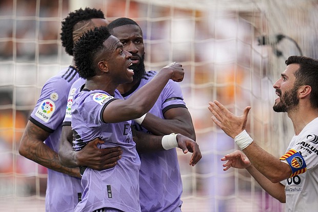 Vinícius reacts after receiving abuse from the stands during Madrid's game against Valencia at the Estadio Mestalla in 2023.
Mandatory Credit:	Aitor Alcalde/Getty Images via CNN Newsource