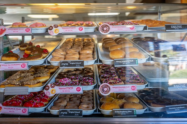 Doughnuts are displayed for sale at a Krispy Kreme store on February 13, in Austin, Texas. Krispy Kreme doughnuts are coming to McDonald’s.
Mandatory Credit:	Brandon Bell/Getty Images via CNN Newsource