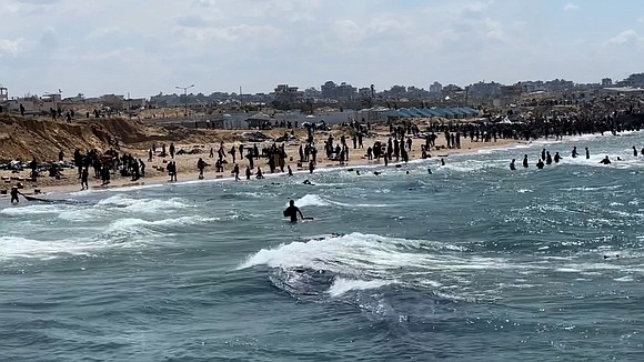 At least 12 Palestinians drowned off the northern Gaza coast near Beit Lahia on Monday while trying to reach airdropped …