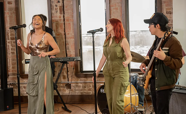 Valen the Valentine (left) and her band perform in the UH-Downtown W.I. Dykes Library
Photo Credit: University of Houston-Downtown