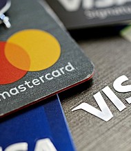 Visa and Mastercard have agreed to settle a case aimed at lowering merchant fees.
Mandatory Credit:	Daniel Acker/Bloomberg/Getty Images via CNN Newsource