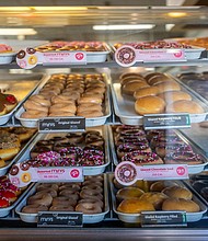 Doughnuts are displayed for sale at a Krispy Kreme store on February 13, in Austin, Texas. Krispy Kreme doughnuts are coming to McDonald’s.
Mandatory Credit:	Brandon Bell/Getty Images via CNN Newsource