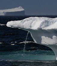 Flowing water from melting ice in Scoresby Fjord, Greenland, on August 12, 2023.
Mandatory Credit:	Olivier Morin/AFP/Getty Images via CNN Newsource