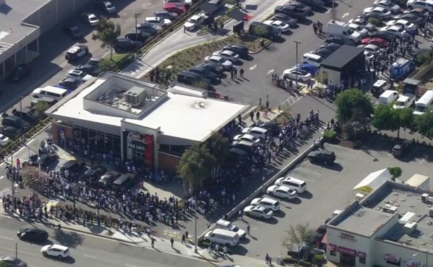 Hundreds lined up at an Alhambra Raising Cane's on March 27 for their chance to be served by the Dodgers' Mookie Betts.
Mandatory Credit:	KCAL via CNN Newsource