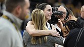 Iowa guard Caitlin Clark celebrates with teammates Monday after a second-round college basketball game against West Virginia in the NCAA Tournament in Iowa City, Iowa. 
Iowa won 64-54.