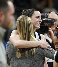 Iowa guard Caitlin Clark celebrates with teammates Monday after a second-round college basketball game against West Virginia in the NCAA Tournament in Iowa City, Iowa. 
Iowa won 64-54.